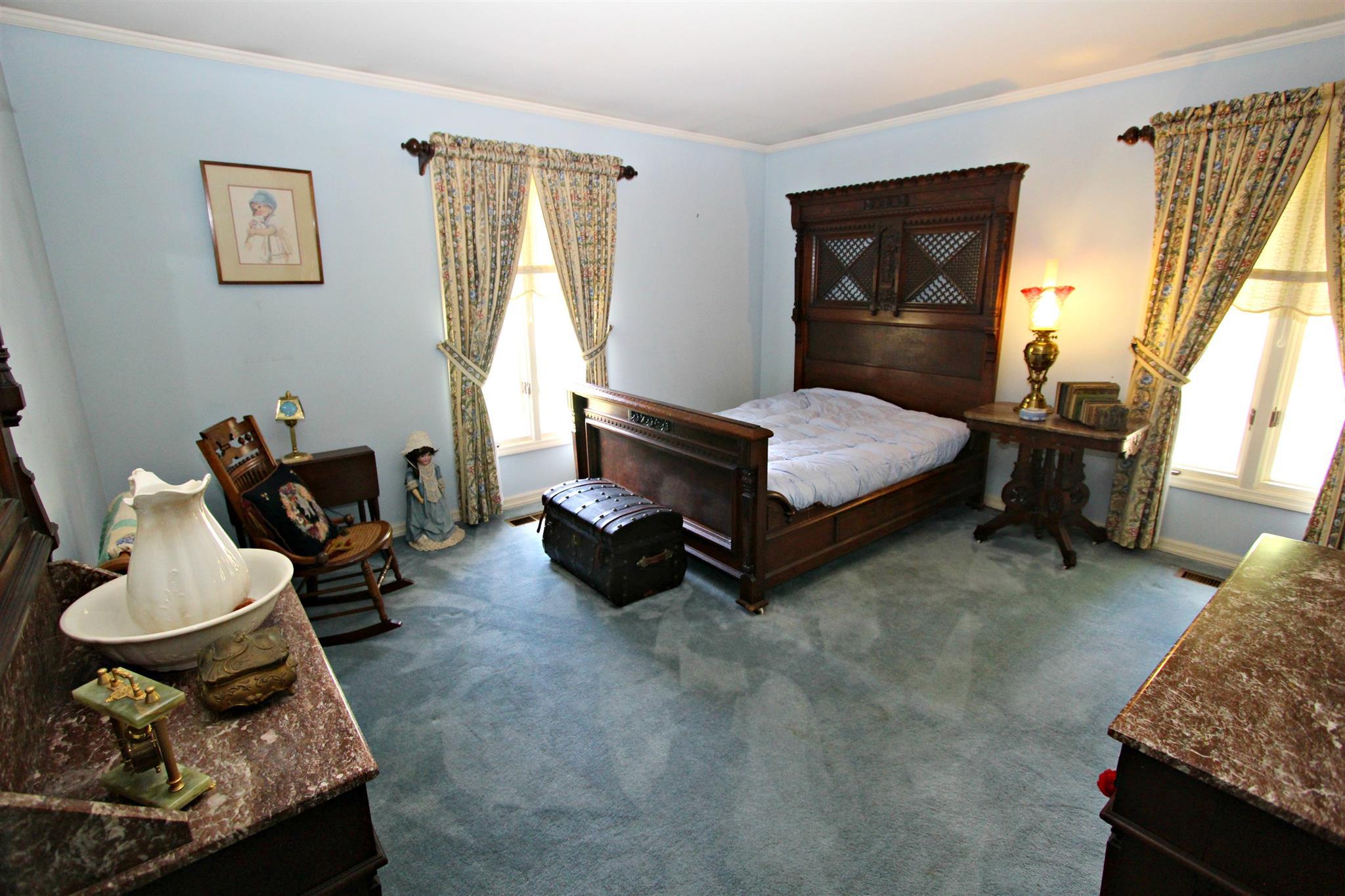 300 Kippsford Pond Road Columbia, TN 38401 - Photo 27 of 36 Fourth bedroom is spacious and has double windows and plush carpet.