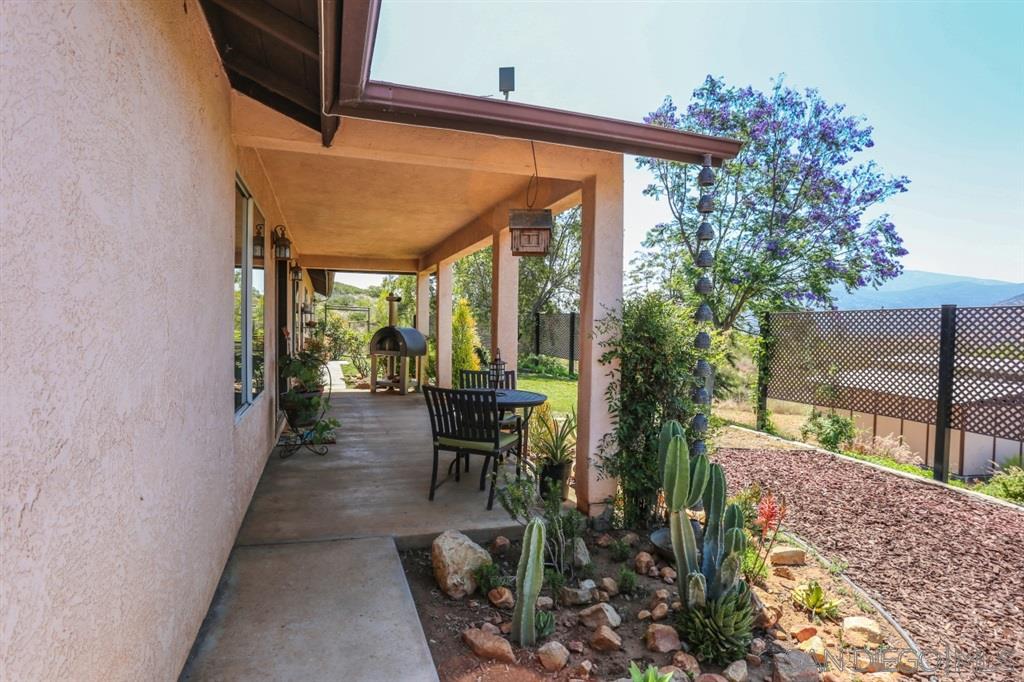 18921 Highway 94 Dulzura, CA 91917 - Photo 4 of 25 The covered porch looking out over the property and surrounding mountains