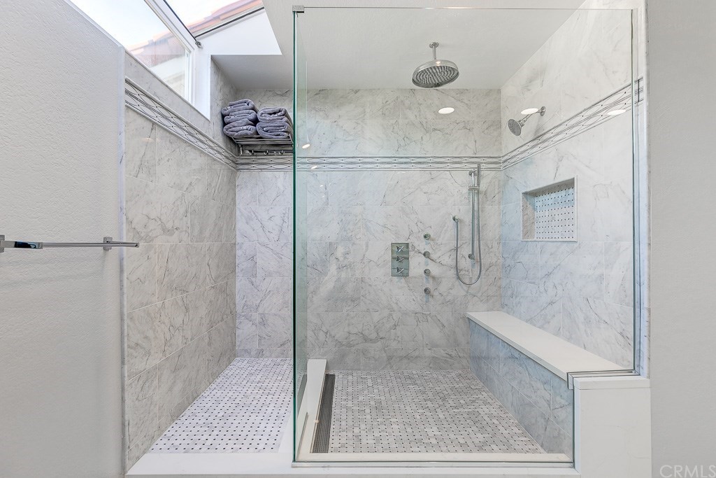 1000 Shadow Canyon Road Brea, CA 92821 - Photo 21 of 32 Marble and tile accents, walk-in shower with rain shower, hand-held, and two body jets.