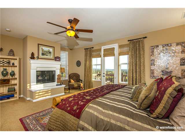 7603 Circulo Sequoia Carlsbad, CA 92009 - Photo 11 of 25 Master Suite with views, balcony, fireplace
