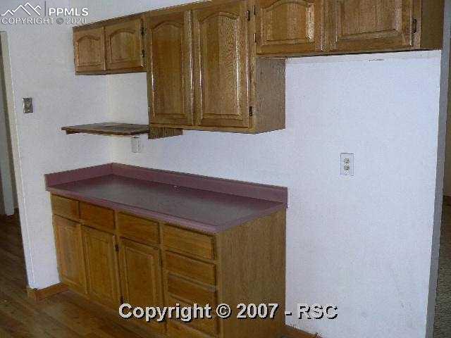 1716 Wooten Road Colorado Springs, CO 80915 - Photo 12 of 16 Kitchen 2