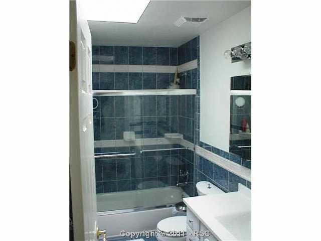 10760 Falling Star Road Fountain, CO 80817 - Photo 8 of 8 Main tiled bathroom