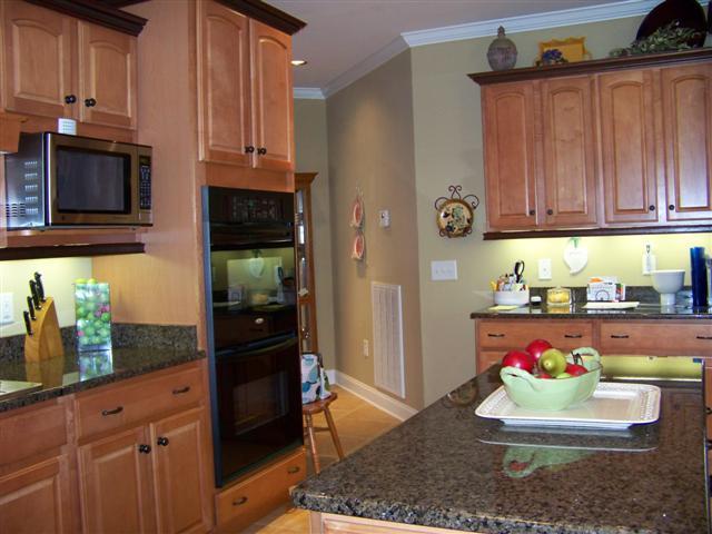 612 Ridgecrest Lane Lebanon, TN 37087 - Photo 19 of 27 17X12 GOURMET KITCHEN W/HARDWOOD. LOTS OF CABINETS, DOUBLE OVENS, GAS GOOKTOP, ISLAND, PANTRY, GRANITE COUNTER TOPS & CENT VAC.