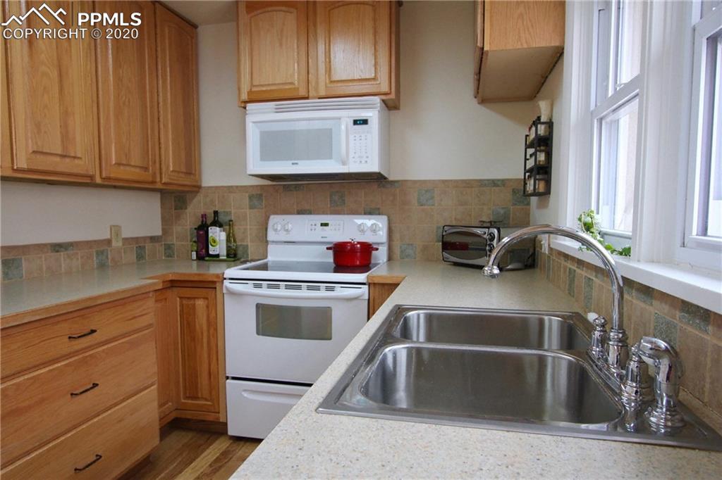 210 Crystal Park Road Manitou Springs, CO 80829 - Photo 6 of 34 Kitchen View 2- Lots of Cabinet Space!
