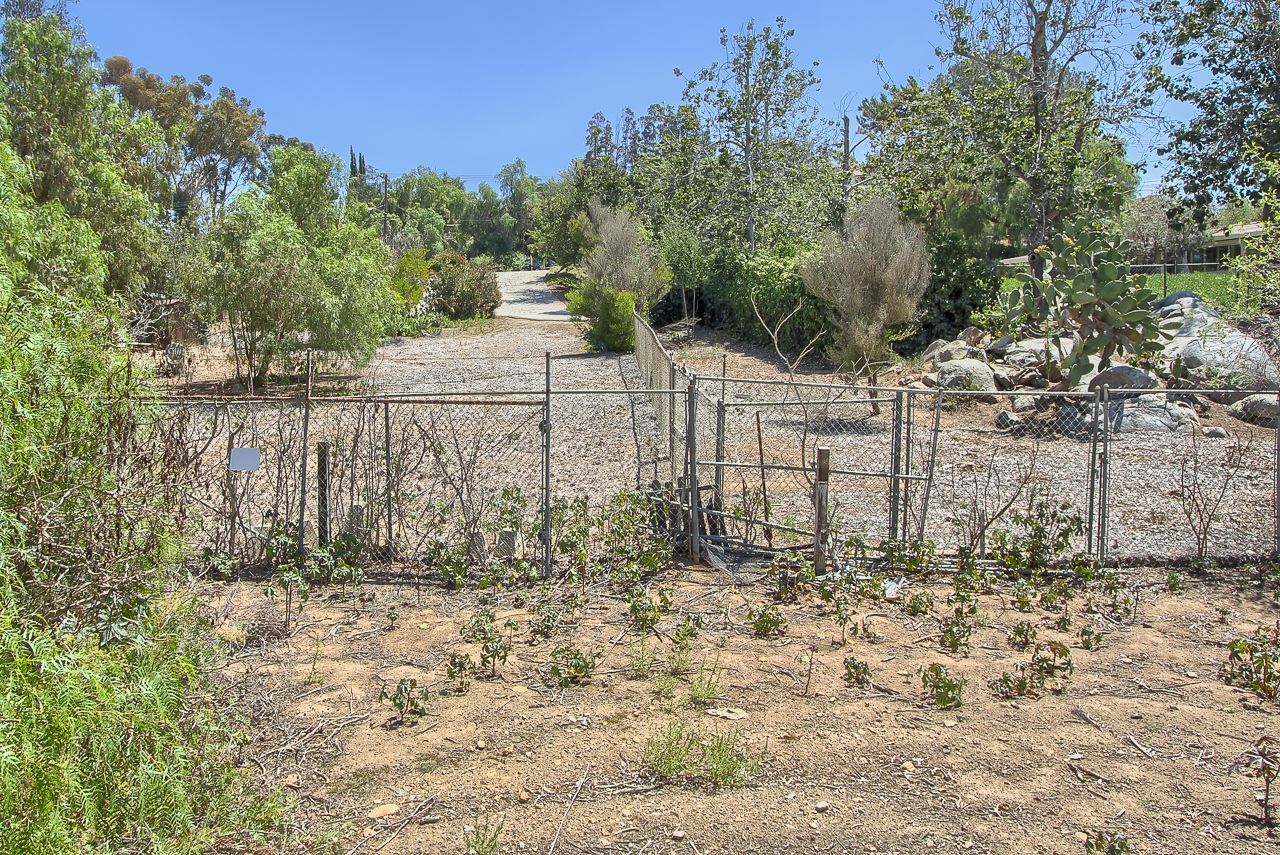 1912 Grove Road El Cajon, CA 92020 - Photo 24 of 25 30 ft wide easement from backyard to Jamacha to allow for parking toys in the backyard.