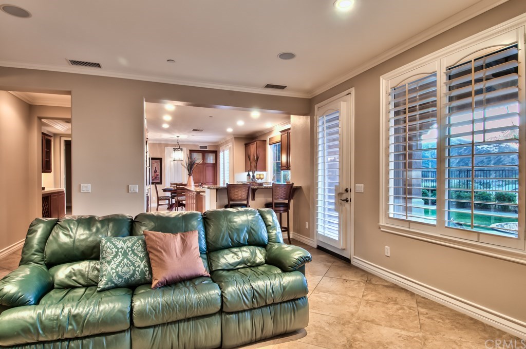 2148 Sageleaf Circle Corona, CA 92882 - Photo 15 of 74 Partial views of the kitchen and family room.