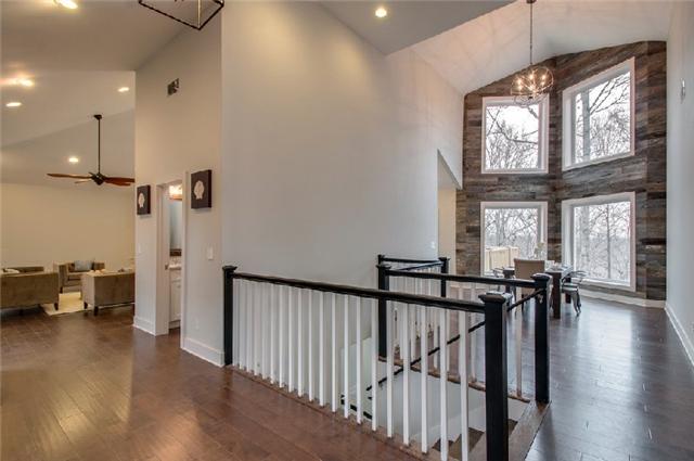 4620 Heath Road Nashville, TN 37221 - Photo 2 of 30 The main level living space is used beautifully | Open flexible space for living, dining & cooking | Large windows w/views from every room on the main level |