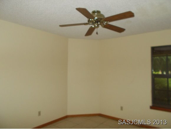 101 Muskogee Road San Mateo, FL 32187 - Photo 13 of 15 Master bedroom