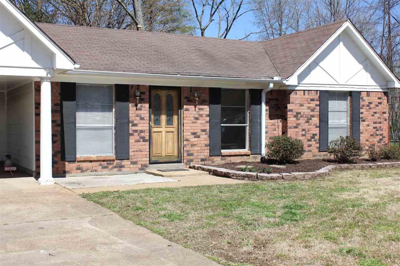 1023 Greencliff Road Collierville, TN 38017 - Photo 1 of 12 Wonderful one story 3 bedroom ranch with covered carport that leads to the kitchen entry.