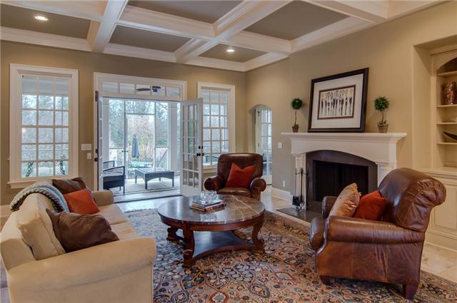 132 Cheek Road Nashville, TN 37205 - Photo 8 of 30 Light filled Living Room with a wood burning fireplace, coffered ceiling, custom built0ins and french doors to the screened porch.