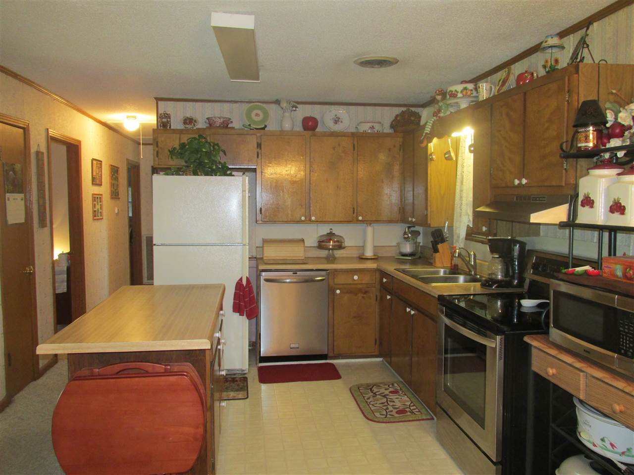 4924 Holly Grove Road Brighton, TN 38011 - Photo 13 of 25 Kitchen has great stainless steel dishwasher, microwave and range.