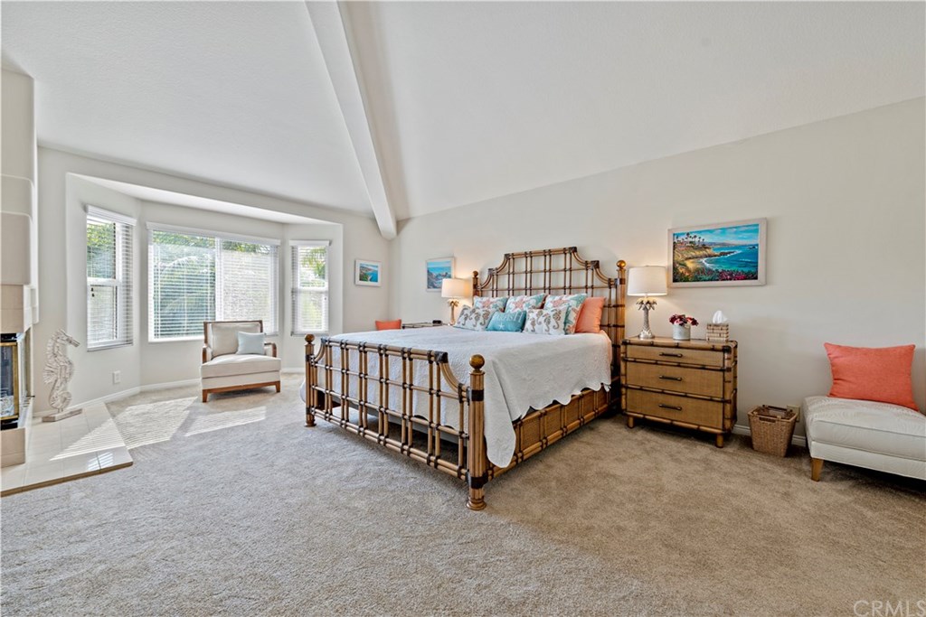 2152 Vallejo Drive Tustin, CA 92782 - Photo 19 of 35 Huge Master Bedroom with volume ceilings & fireplace. Light and bright!