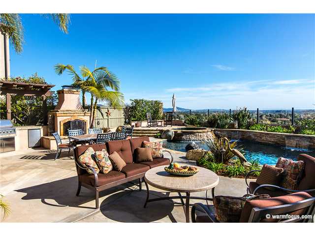 7603 Circulo Sequoia Carlsbad, CA 92009 - Photo 19 of 25 Custom pool, waterfalls, spa, fireplace & fire pit