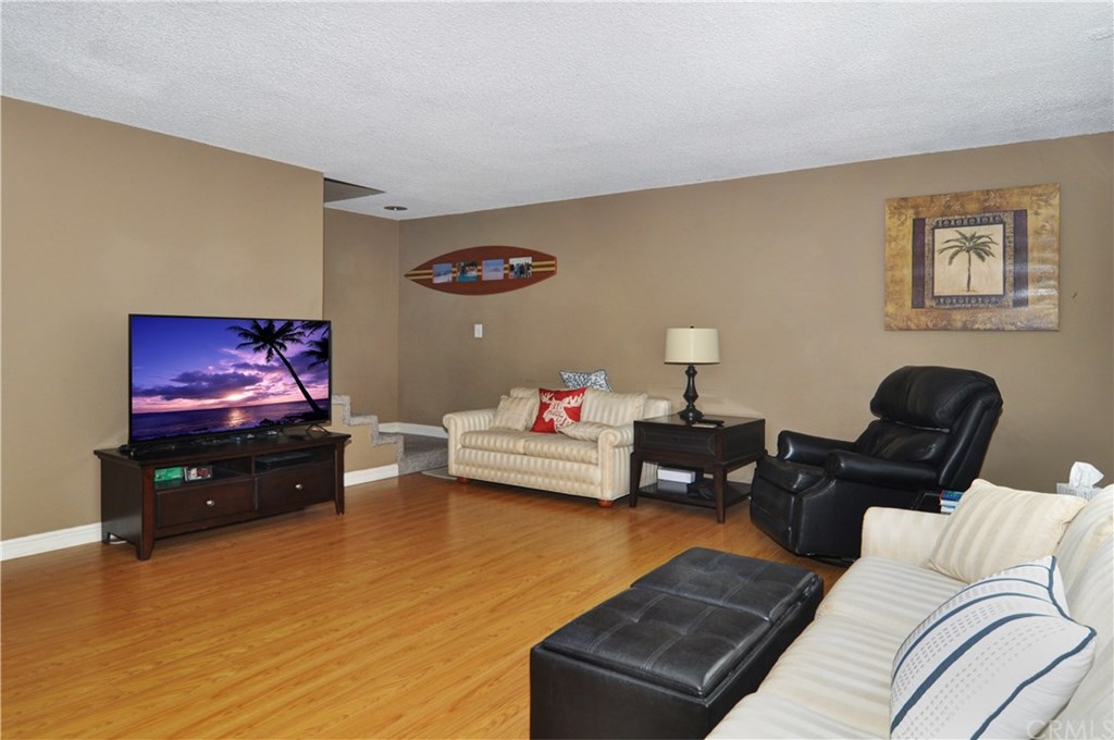 253 17th Street Seal Beach, CA 90740 - Photo 20 of 36 Very spacious and relaxing living room picture from the front door.