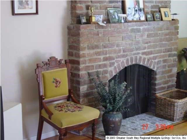 628 19th Street Manhattan Beach, CA 90266 - Photo 6 of 7 Cozy Fireplace in Huge Sitting Room