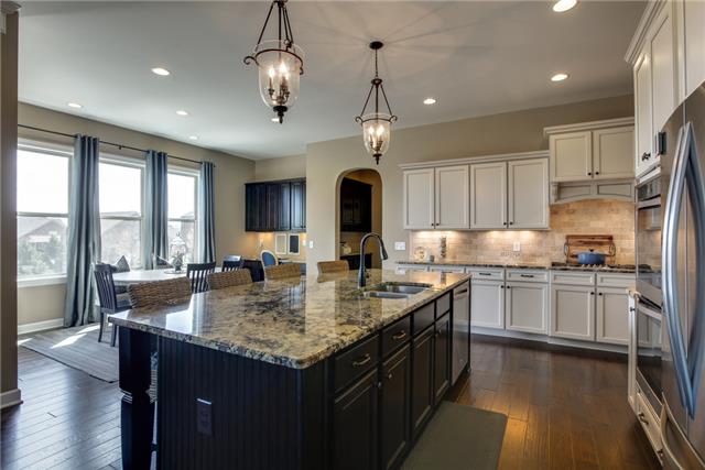 3124 Herbert Drive Franklin, TN 37067 - Photo 12 of 45 Well-appointed with stainless steel appliances, gas stove and double oven. Plenty of counter space