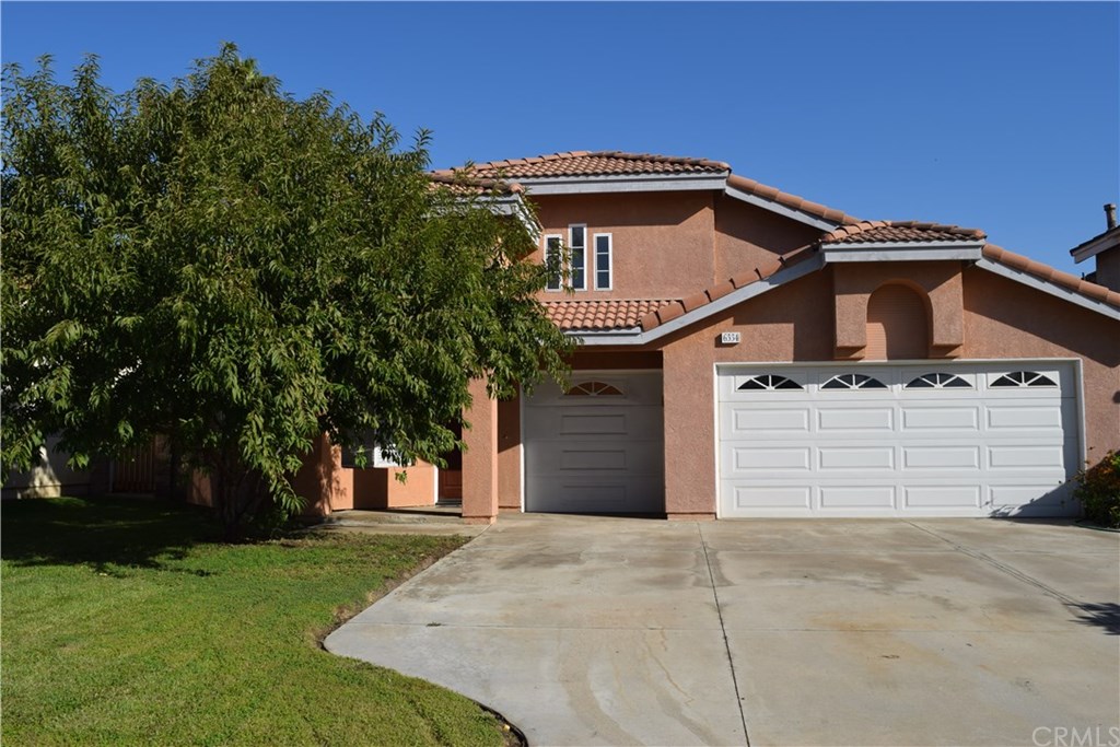 Great Curb appeal , extra wide driveway, and spacious 3 car garage with code panel for easy access.