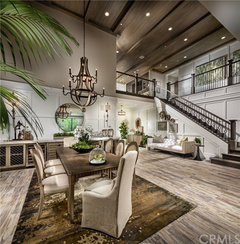 61 Buttonquail Irvine, CA 92618 - Photo 3 of 15 Dining room and Entry. Photo of model home not actual home for sale.