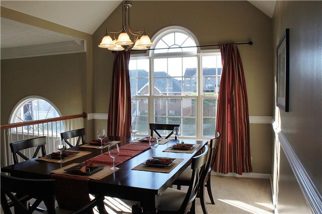 736 Winding Bluff Way Clarksville, TN 37040 - Photo 4 of 16 Lovely Formal Dining Room with Vaulted Ceiling, Chair Rail and Lots of Natural Light