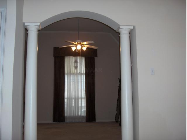 774 North Ericson Road Memphis, TN 38018 - Photo 3 of 12 Looking from the dining room back into the living room at the oversized Palladian window