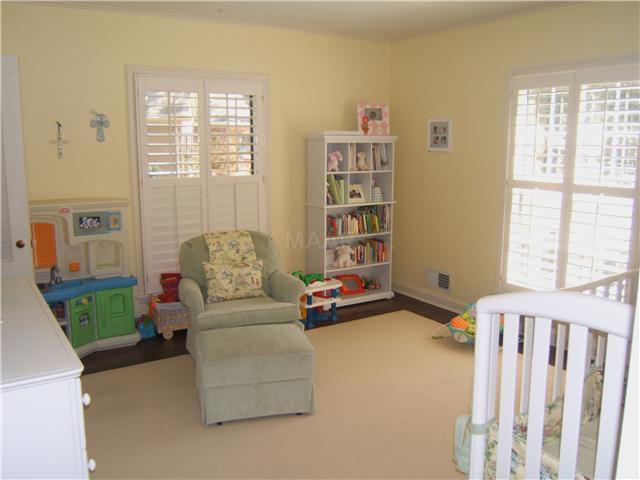 5098 North Angela Road Memphis, TN 38117 - Photo 9 of 11 Adorable Childs Bedroom with plantation shutters.
