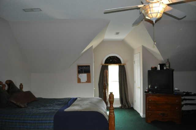 487 Corders Crossroads Road Fayetteville, TN 37334 - Photo 24 of 30 Upstairs room can be used as a bedroom, media room, or rec room. There is a full bath upstairs in this room as well as walk in access to the attic.