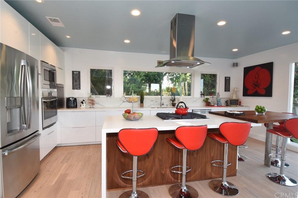 12 Harbor Sight Drive Rolling Hills Estates, CA 90274 - Photo 5 of 56 This totally hip new kitchen rocks! The custom walnut island is gorgeous, and there are cabinets and counter tops galore!