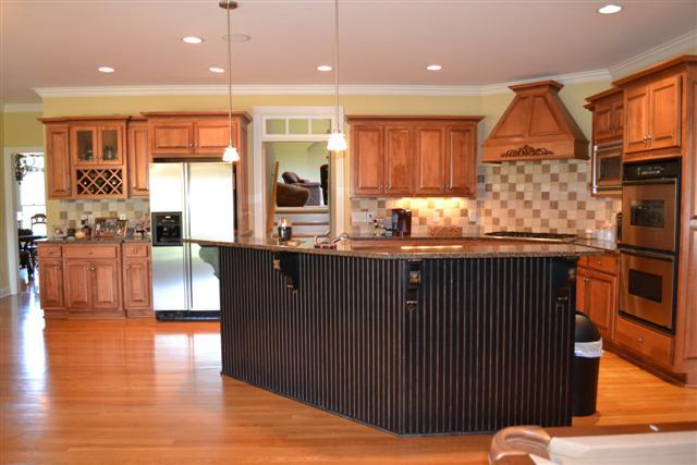 597 Walnut Grove Road Lebanon, TN 37090 - Photo 9 of 24 21X20 KITCHEN W/CUSTOM CABINETS GRANITE TOPS, GAS COOKTOP, DBL OVEN
