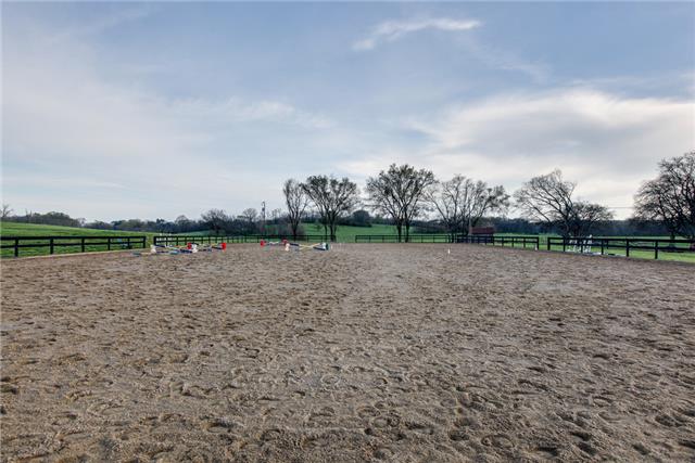 13920 Patterson Road College Grove, TN 37046 - Photo 6 of 30 100X180 riding arena overlooks the green pastures. A peaceful place to work your horses.