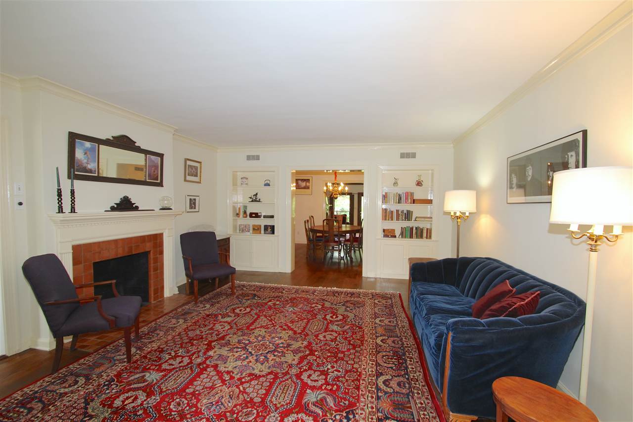 418 Greenfield Road Memphis, TN 38117 - Photo 12 of 25 Notice the double built-in bookcases with cabinets.