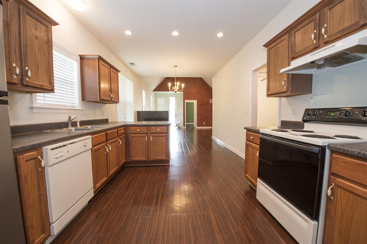 1237 Misty Isle Drive Memphis, TN 38103 - Photo 5 of 22 View from the back of the kitchen looking toward the front door. Notice the nice counters and recessed lights throughout the kitchen.