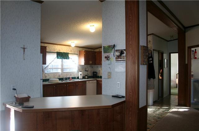 65 Redd Branch Road Fayetteville, TN 37334 - Photo 13 of 30 Breakfast nook of home offers the bar and semi privacy to the Country Kitchen of home.