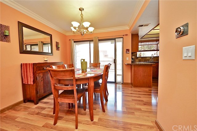 1208 Mayflower Avenue, Unit C Monrovia, CA 91016 - Photo 16 of 47 Spacious dining room with crown moulding & sliding glass door to another patio