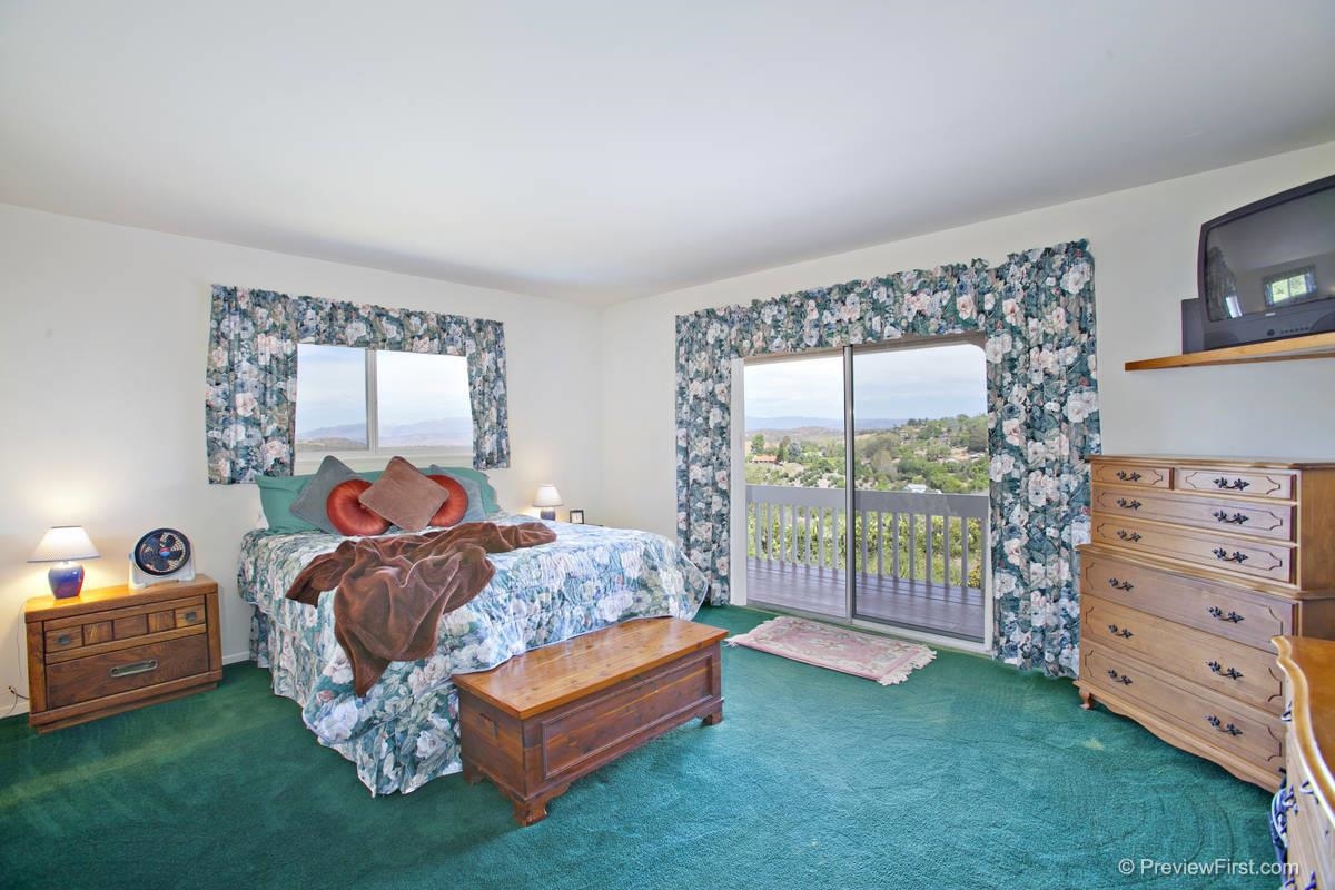 4933 Conejo Road Fallbrook, CA 92028 - Photo 5 of 25 Master Bedroom opens onto the balcony for enjoyment of the stunning views & ocean breezes