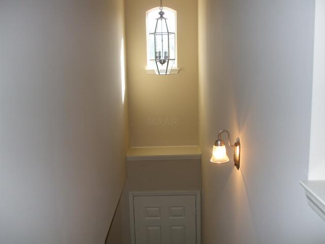 8734 Macon Road Memphis, TN 38016 - Photo 5 of 6 OPEN ENTRY AND STAIRCASE W/DECORATIVE LEDGE