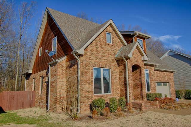 160 Foxrun Springfield, TN 37172 - Photo 3 of 30 This mostly brick home is trimmed with real western cedar siding and has a gorgeous aggregate front entry driveway.