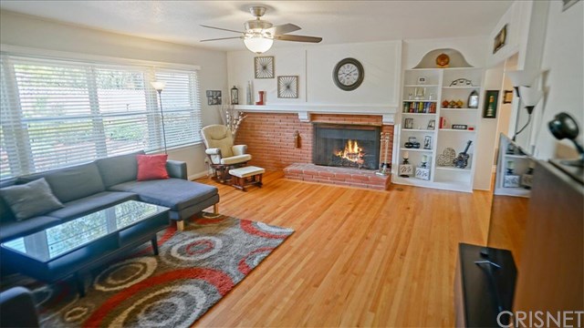 16809 Tupper Street Northridge, CA 91343 - Photo 4 of 19 Built-in shelves and fireplace