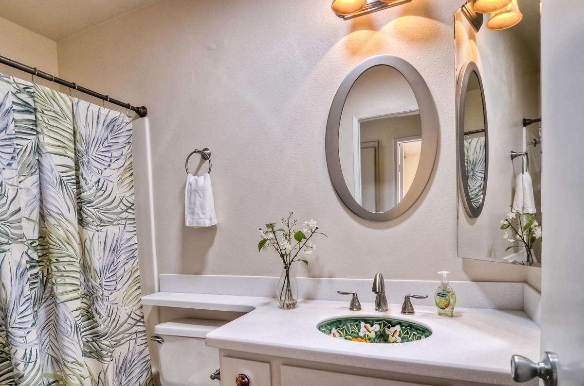 4282 Dowitcher Way Oceanside, CA 92057 - Photo 11 of 21 Everything is clean in this place. Solid surface counter tops are custom designed to show off the hand painted sink.