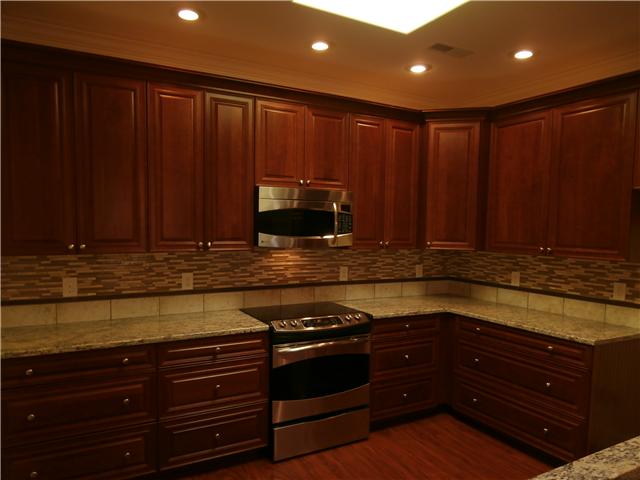 110 Riley Circle Fayetteville, TN 37334 - Photo 9 of 22 SKYLIGHT ALLOWS FOR LOTS OF NATURAL LIGHT WITH STAINLESS APPLIANCES AND GLASS TILE BACKSPLASH