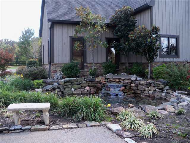 745 Anderson Road Moscow, TN 38057 - Photo 8 of 25 Enjoy the sounds of this beautiful stone fish pond and fountain