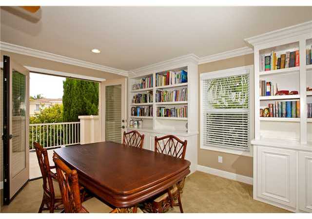 5255 Greenwillow Lane San Diego, CA 92130 - Photo 20 of 25 One section of Bonus Room upstairs with built-in bookcases and balcony