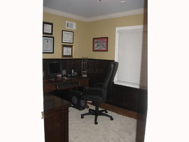4503 Fair Meadow Road Memphis, TN 38117 - Photo 8 of 9 Great office with stained beadboard wainscotting or paint the beadboard white and make an adorable nursery! Notice the great crown molding that has been added throughout the house.