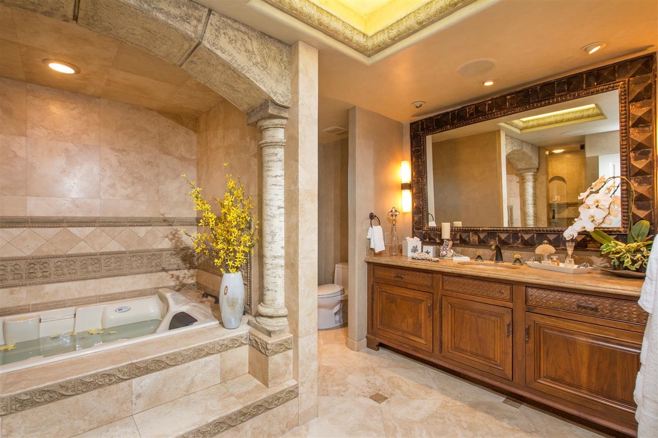 1435 Coast Walk La Jolla, CA 92037 - Photo 16 of 22 Escape to the Master Bath with Jacuzzi Tub and Steam Shower.