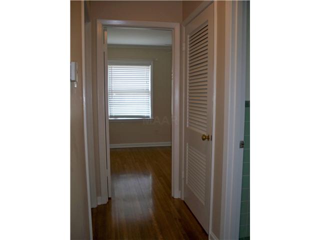 5092 Sequoia Road Memphis, TN 38117 - Photo 10 of 17 Hallway...notice the shutter style closet doors, original to the home.