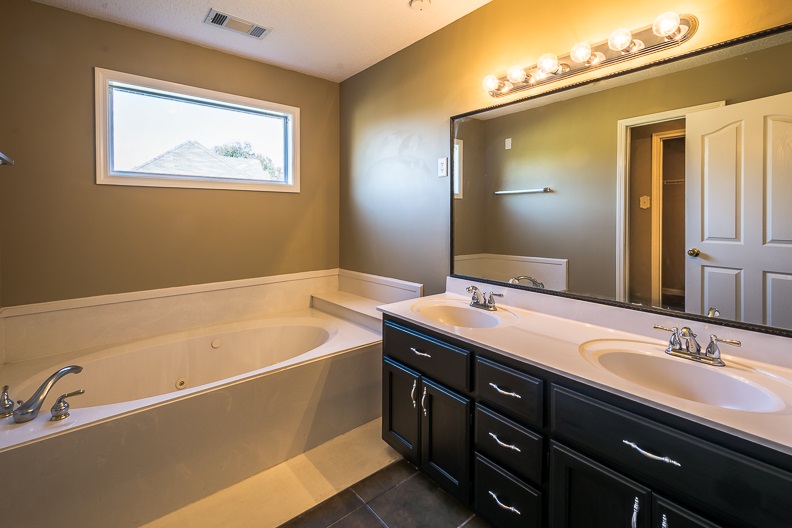 2555 Tracy Road Atoka, TN 38004 - Photo 10 of 21 Dual Vanity, Tile Floor, Whirlpool Bathtub, Separate Shower and Water Closet.