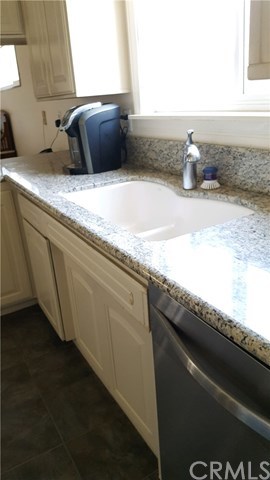 15744 Marlinton Drive Whittier, CA 90604 - Photo 14 of 52 Kitchen, granite counters, stainless steel in and out newer dishwasher, window over sink