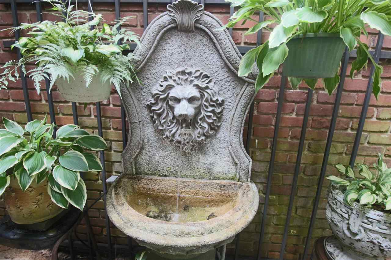 3146 Dumbarton Road Memphis, TN 38128 - Photo 24 of 25 The backyard is made complete with a fountain!