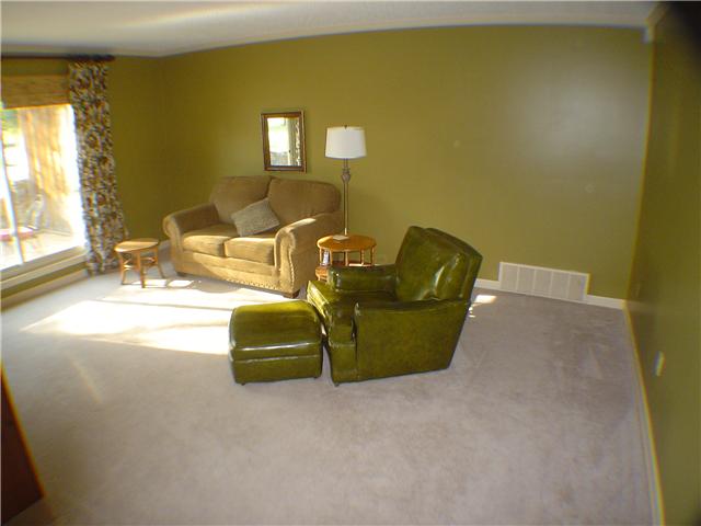 8114 Donnell Road Millington, TN 38053 - Photo 8 of 10 Spacious Living Room with carpet and designer colors