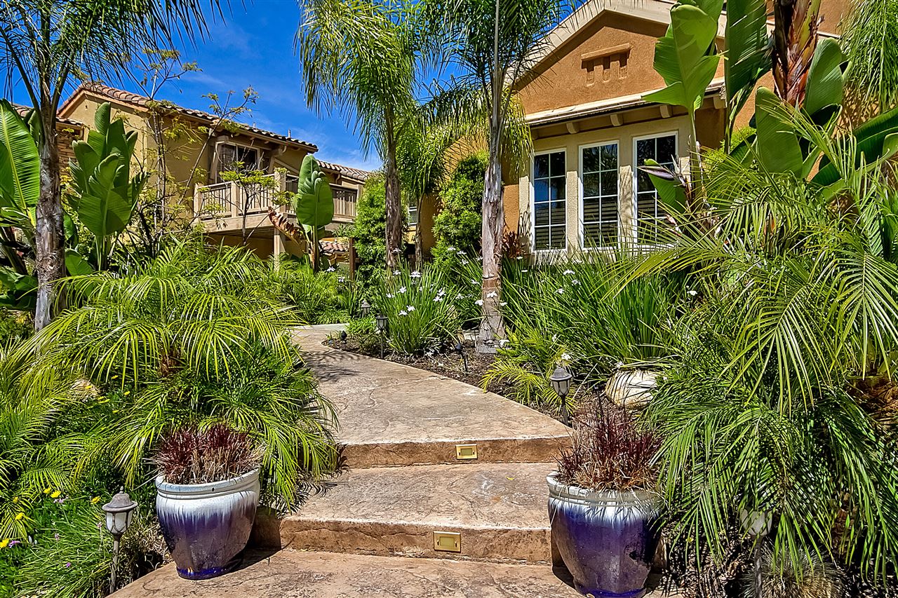 1853 Shadetree Drive San Marcos, CA 92078 - Photo 3 of 25 Beautiful textured concrete stairs with built in lighting.
