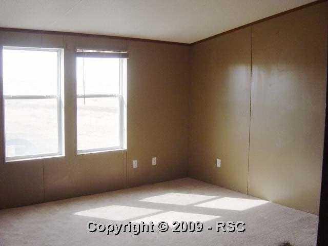 14925 Kanuch Road Calhan, CO 80808 - Photo 11 of 15 Master Bedroom